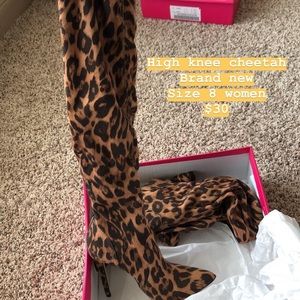 High knee cheetah boots